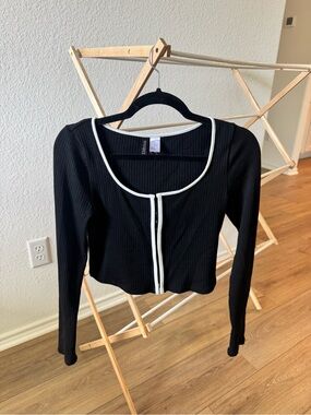 Divided Black Ribbed Long-Sleeve top with White Trim
